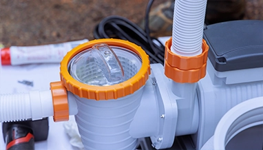 Sand filter maintenance performed during professional pool equipment service by Commercial Pool Kings.